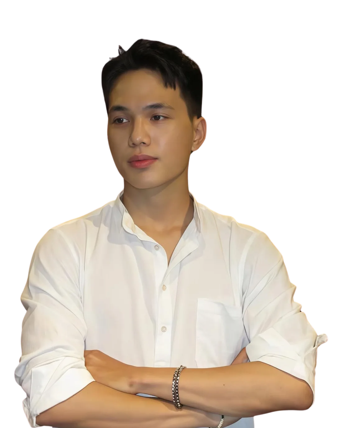Long Vu in a white shirt with his arms crossed.